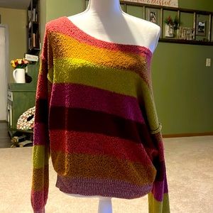 Free People sweater. Can be worn off the shoulder or on. Multi color. Like new!